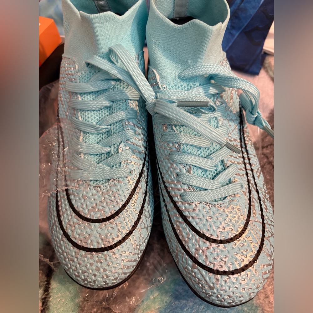 Light Blue Athletic Shoes with Black Accents